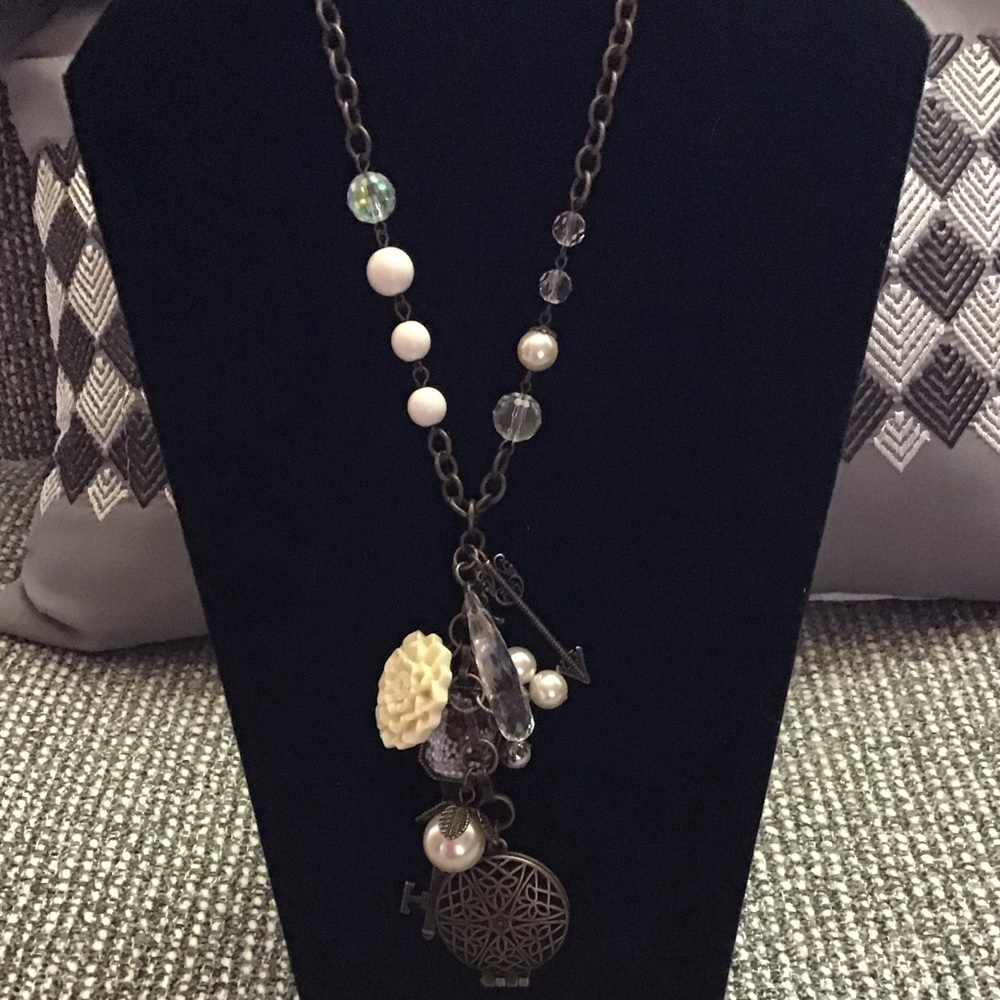 Long necklace with multiple pendants